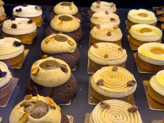 Delicious assortment of gourmet pastries displayed at a local bakery market during the afternoon