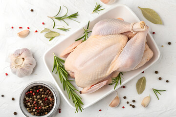 Raw Full Chicken on a White Background