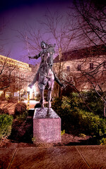 Statue of Joan of Arc on the forecourt of Reims Cathedral. It is a work by the French sculptor Paul Dubois. It is a bronze equestrian statue of Joan of Arc. © Carole