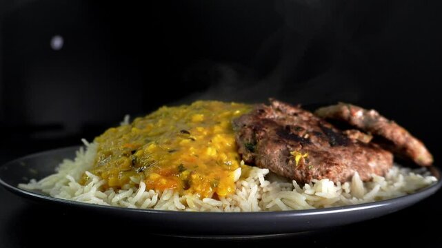 Daal chawal and meat kabab, rice with lantil and beaf