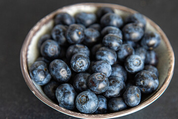 blueberry ripe juicy berries vitamins natural product snack fresh tasty food dish gourmet food background on the table rustic food top view copy space keto and paleo diet Vegetarian and vegan food