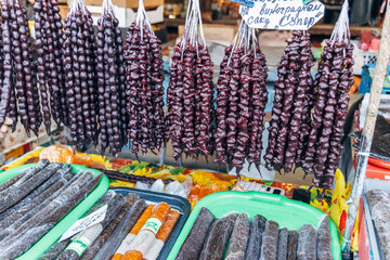 Churchkhela made from nuts hangs at a local market.