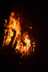 Intense Flames Dancing in the Dark Night Sky with Glowing Light