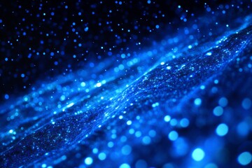 Fototapeta premium A captivating background with radiant blue light rays and scattered particles, ideal for science and technology themes. It adds depth and creativity to enhance any artistic project