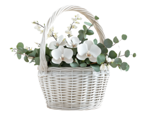 Elegant white basket with magnolia flowers and eucalyptus leaves.
