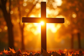 Sun shining through a cross on a background of golden autumn leaves in fall, symbolizing faith and hope. powerful message of belief and optimism.Cross, Faith, Hope, Conviction