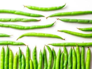 Fresh Green Beans Arranged on White Background

