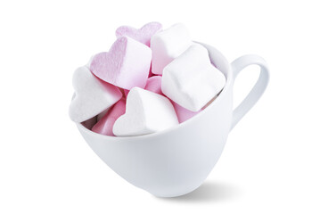 Marshmallows in the form of heart in a white cup on a white isolated background