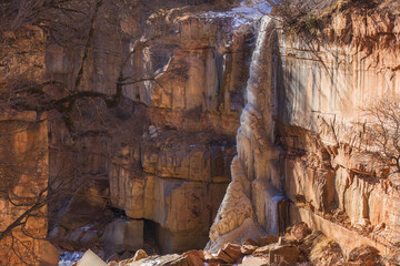Frozen waterfall in the mountains