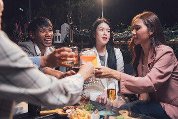 Nightlife Cheers: Friends Toast Success at a Rooftop Bar 