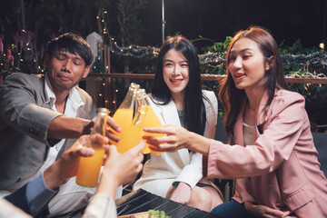 Nighttime Cheers: Friends Toasting Together 