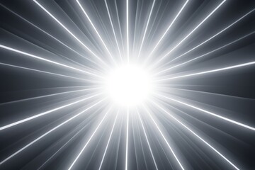 Obraz premium a close up of a black and white photo of a light burst