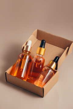 Three bottles of glass, neatly packed in a box