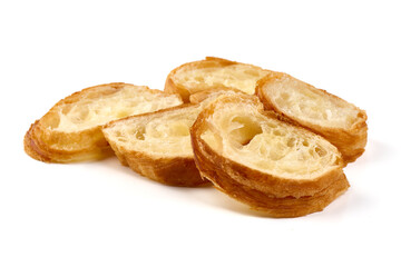 Freshly baked baguette slices, isolated on white background.