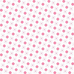 A pink floral patterned background with white flowers