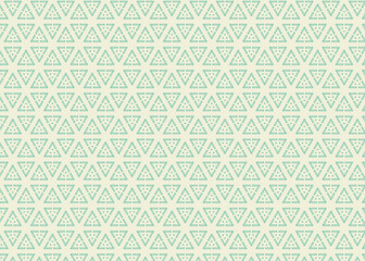 A green and white patterned background. The pattern is made up of triangles
