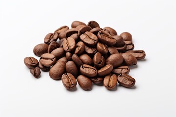 Naklejka premium Roasted coffee beans forming a small pile on a white background, ideal for representing coffee, breakfast, or caffeine