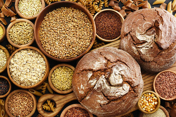Whole grains concept. Colorful mix of grain varieties: oat and wheat, rice and millet, buckwheat and barley, quinoa and polenta. Food ingridients for healthy diet background, selective focus