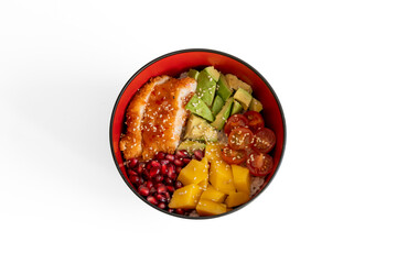Paris, France - 02 20 2023: Hawaiian culinary Still Life. A Chicken Katsu Poke Bowl with tomatoes, mango, pomegranate, avocado and rice viewed from above and placed on a white background.