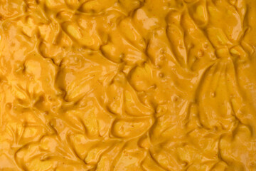 Yellow sauce splashes as a background.