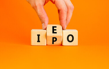 Initial public or exchange offering symbol. Concept words abbreviation IPO IEO on wooden block....
