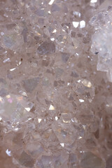 Brilliant Precious stones. Mineral crystals in the natural environment. Texture of precious and semiprecious stones. Seamless background of colored shiny surface of precious stones. Argonium white.