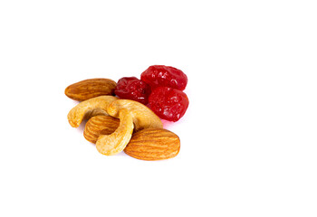 Natural nuts with dried cherries on a white background, vegetarian food