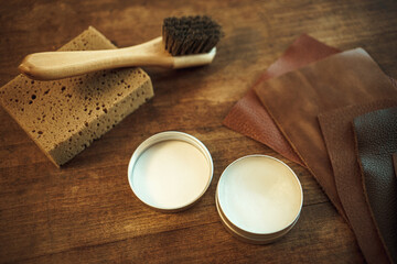 Wax for processing leather goods.Protection of the skin from moisture. A jar of mink wax.