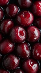Vibrant and glossy cherries showcased in a detailed close-up, highlighting their natural shine and rich red hues.