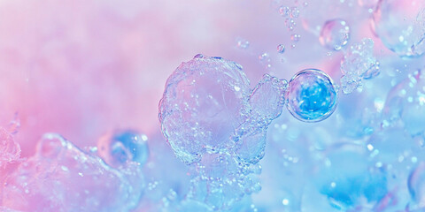 Bubbles floating in pastel shades of pink and blue