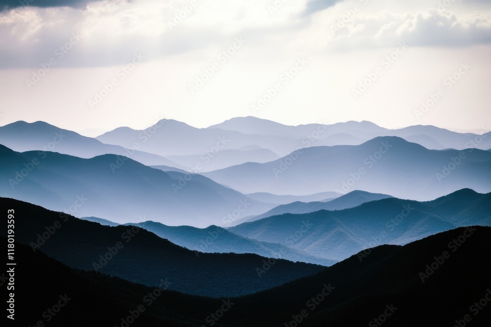 Aufkleber A distant view of a mountain range with varying elevations and terrain