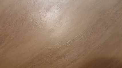 Close-up of a textured wooden surface with subtle natural grain patterns.