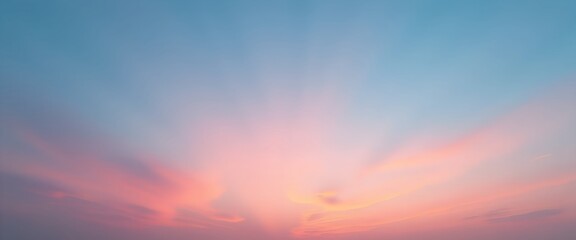 Obraz premium Pastel sunset sky. Soft pink and blue hues paint the evening sky, creating a serene and tranquil atmosphere. Perfect for backgrounds, design, or peaceful imagery.