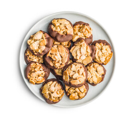 Photography of chocolate Florentines cookies with almonds and chocolate on plate isolated on white background.