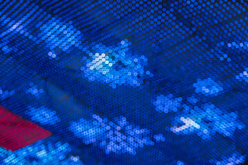 View on blue abstract background with bokeh defocused lights. New Year, Christmas