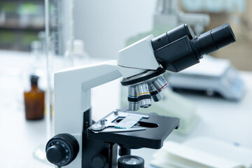 Microscope and optical instruments in hospital lab for sample analysis and test