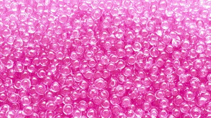 pink embellishments, round decorative elements, pink glass spheres, pretty pink beads, close-up view of beads, pink translucent spheres, pattern of round beads, colorful translucent spheres close-up