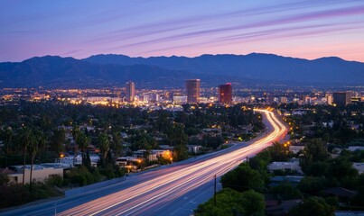 Cityscape at Twilight with Light Trails on Urban Highway