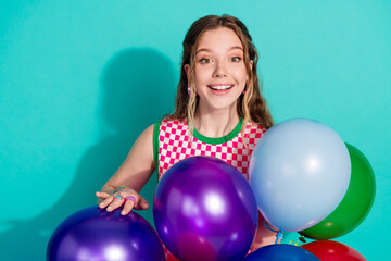 Fototapeta premium Photo portrait of lovely teen lady cheerful air balloons dressed stylish pink plaid garment isolated on cyan color background
