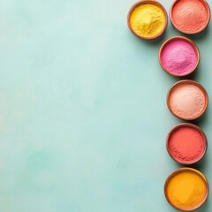 Holi Color Powders in Wooden Bowls on Teal Background 2