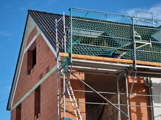 House extension - A new house with a new apartment was added to the residential building.