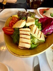 Grilled Halloumi cheese salad served at restaurant with hellim