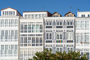 Typical buildings with characteristic windows on the seafront of the city of La Coruña, La...