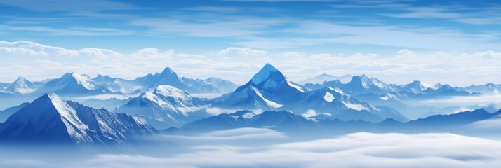 Obraz premium Spectacular Snow-Capped Mountain Range With Majestic Peaks Rising Above a Sea of Clouds Under a Vivid Blue Sky in a Serene Natural Landscape