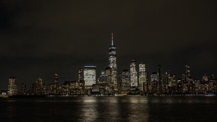 Obraz premium World Trade Center skyline at night. One World Trade Center at night time. WTC memorial. New York City skyscrapers. Freedom Tower.