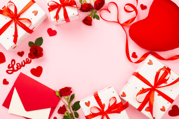 Valentine's Day composition with gifts and red roses on color background, top view