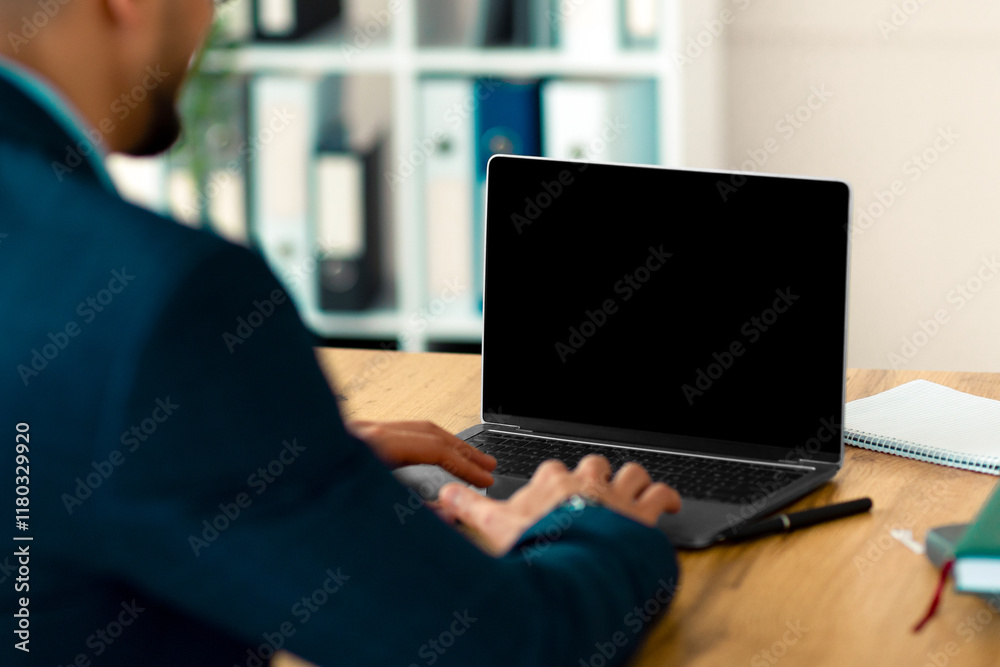 Aufkleber unrecognizable arab entrepreneur working on laptop pc with blank screen at office, mockup for websit