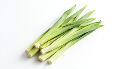 Fresh green stalks of  iris leaves on white background.