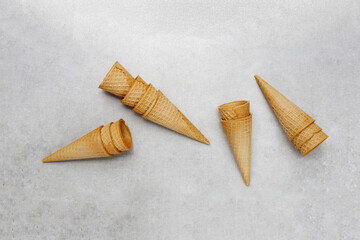 Waffle cones on grey background