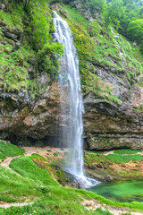 Goriuda Cave and Wtarefall, a spectacular landmark in Dolomites Alps Mountains Italy